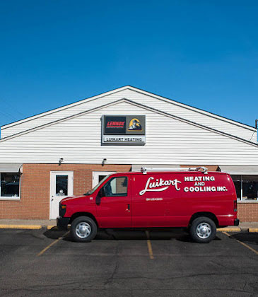 Luikart van in front of the shop